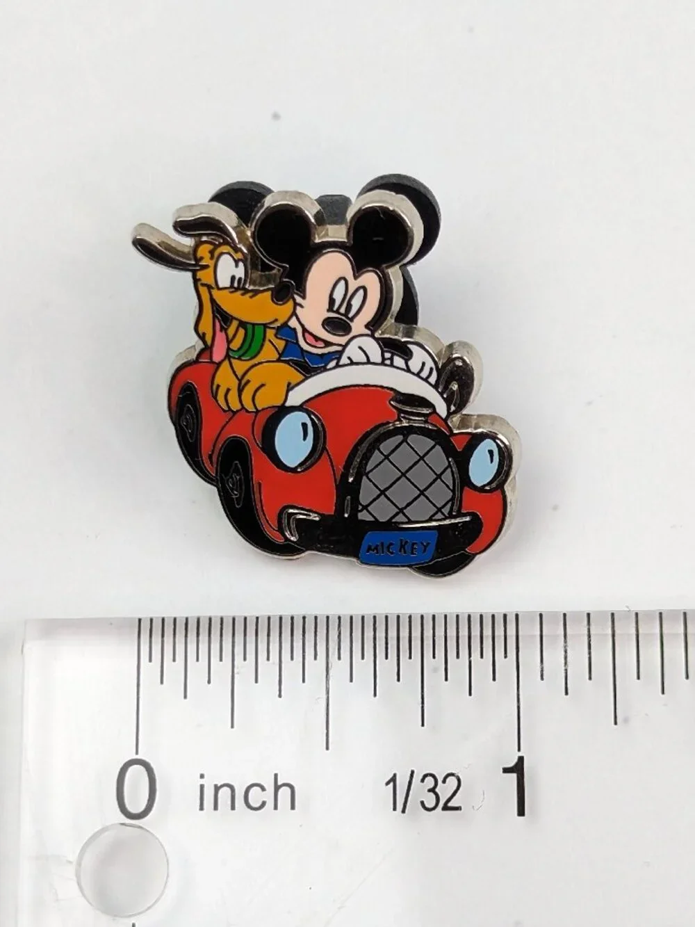 DISNEY AND AAA TRAVEL PIN -- MICKEY MOUSE AND PLUTO IN A RED CAR -- 2003